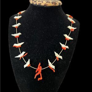 Vintage coral and mother of pearl Bird charms on a silver necklace